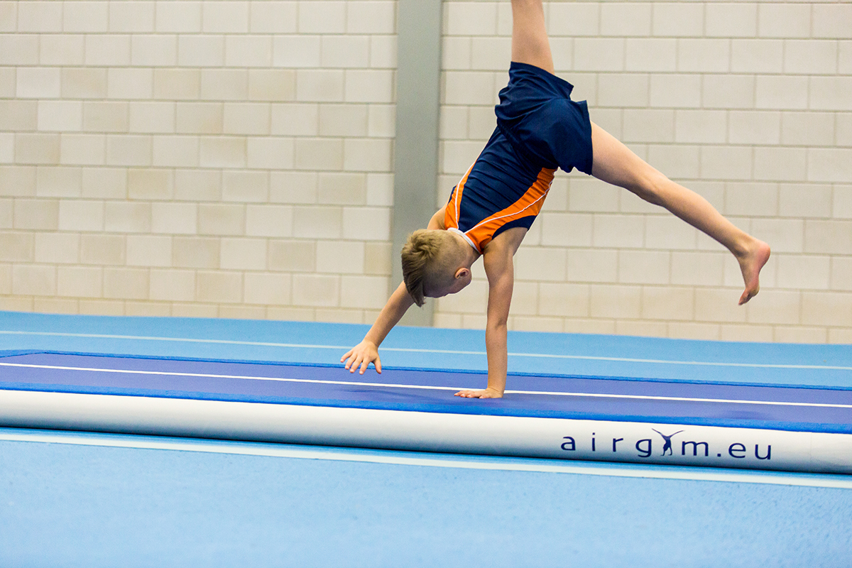 boy on airtrack coaching set plus Airgym